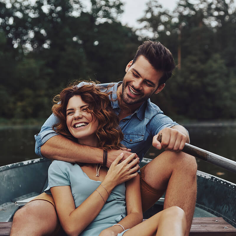 Couple hugging on a boat