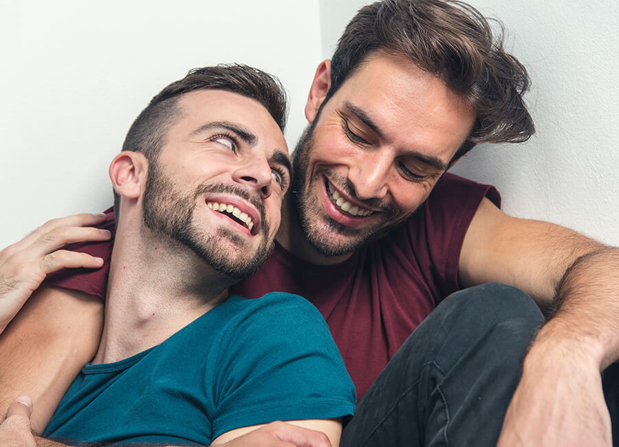 Male couple laughing together